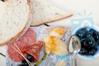 Mix Cold Cut On A Stone With Fresh Pears Stock Photo