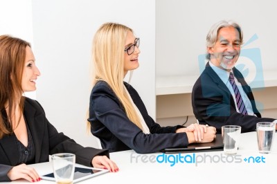 Mixed Group In Business Meeting Stock Photo