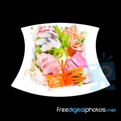 Mixed Sashimi In White Plate Isolated On Black Background,with C… Stock Photo