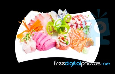 Mixed Sashimi In White Plate Isolated On Black Background,with C… Stock Photo