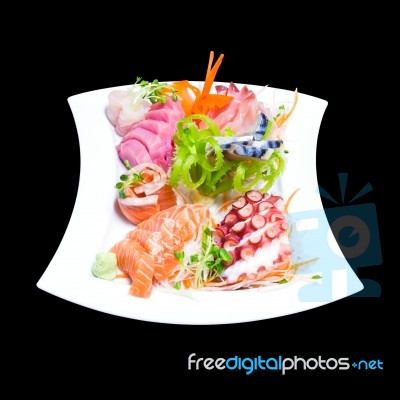 Mixed Sashimi In White Plate Isolated On Black Background,with C… Stock Photo