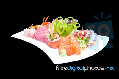 Mixed Sashimi In White Plate Isolated On Black Background,with C… Stock Photo