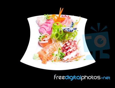 Mixed Sashimi In White Plate Isolated On Black Background,with C… Stock Photo