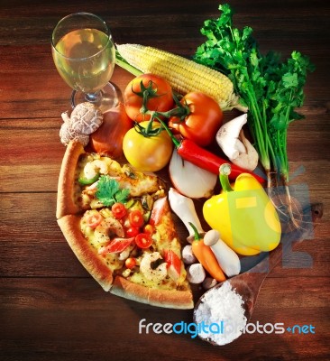 Mixed Vegatables With Pieces Of Seafood Pizza Stock Photo