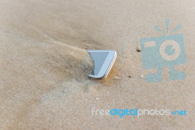 Mobile Phone Floated To The Sea At The Beach Stock Photo