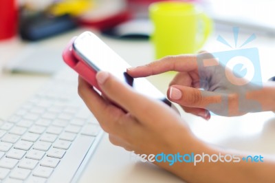 Mobile Phone In A Woman's Hand. Indoor Image Stock Photo