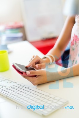 Mobile Phone In A Woman's Hand. Indoor Image Stock Photo