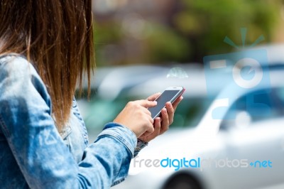 Mobile Phone In A Woman's Hand. Outdoor Image Stock Photo