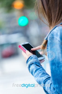 Mobile Phone In A Woman's Hand. Outdoor Image Stock Photo