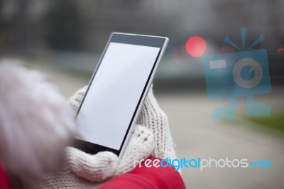 Mobile Phone In Hands With Glowes, Cold Weather Stock Photo