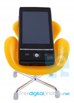 Mobile Phone On Chair Stock Photo