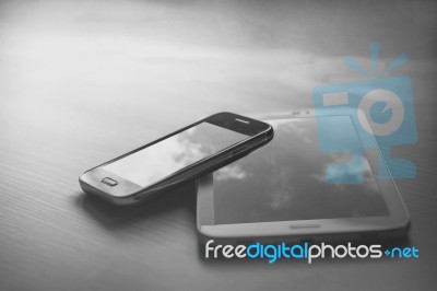 Mobile Phones With Black And White Stock Photo