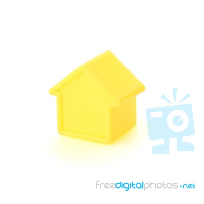 Model Plastic Small House On White Floor Stock Photo