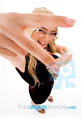 Model Showing Victory Peace Hand Gesture Stock Photo