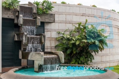 Modern Art Man Made Waterfall And Pool Stock Photo