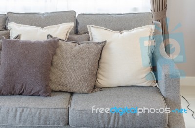 Modern Grey Sofa With Pillows Stock Photo