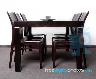 Modern Wooden Finished Dining Table Stock Photo