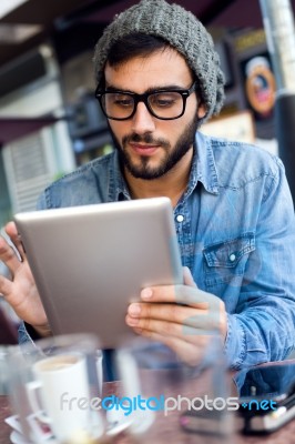 Modern Young Man With Digital Tablet In The Street Stock Photo