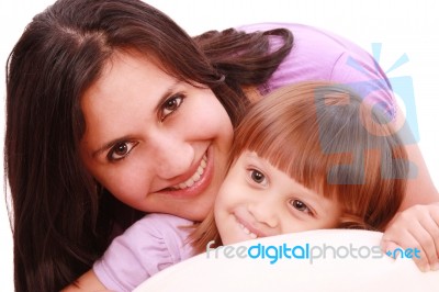 Mom And Daughter Posing Together Stock Photo