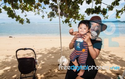 Mom And Son Enjoying The Happy Time Stock Photo