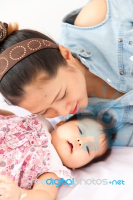 Mom Is Enjoying With Her Baby Stock Photo