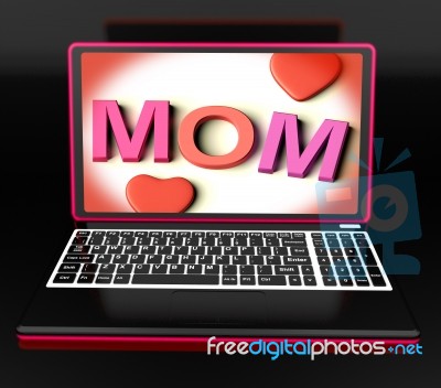 Mom On Laptop Showing Digital Card Stock Image