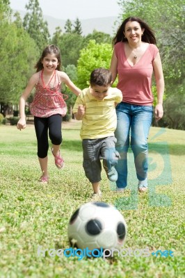 Mom Playing With Children Stock Photo