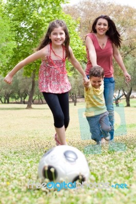 Mom Playing With Children Stock Photo