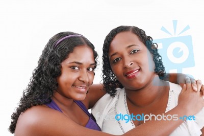 Mom With Daughter Looking At Camera Stock Photo