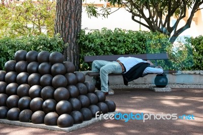 Monte Carlo, Monaco/europe - April 19 : Man Asleep In The Shade Stock Photo