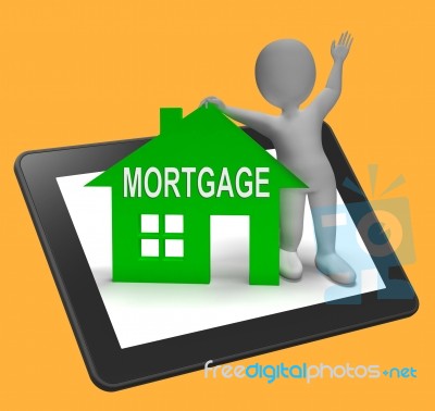 Mortgage House Tablet Shows Paying Off Property Debt Stock Image