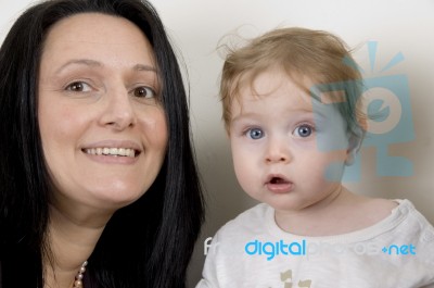 Mother And Child Looking To Camera Stock Photo