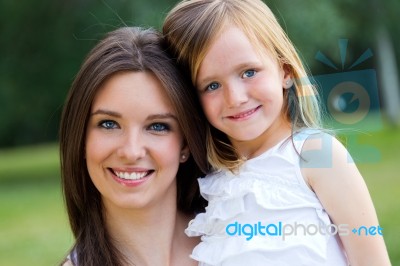 Mother And Daughter Having Fun Outdoors Stock Photo