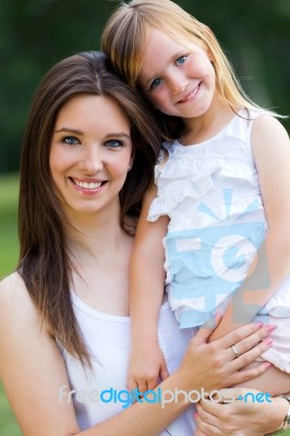 Mother And Daughter Having Fun Outdoors Stock Photo