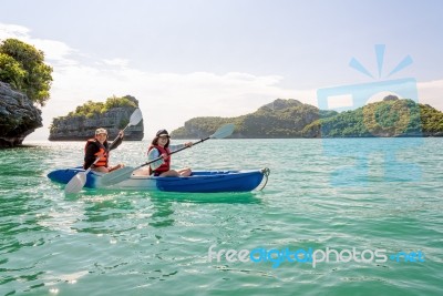 Mother And Daughter On Kayak Stock Photo