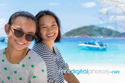 Mother And Daughter On The Beach At Similan Islands, Thailand Stock Photo