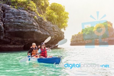 Mother And Daughter Travel By Kayak Stock Photo