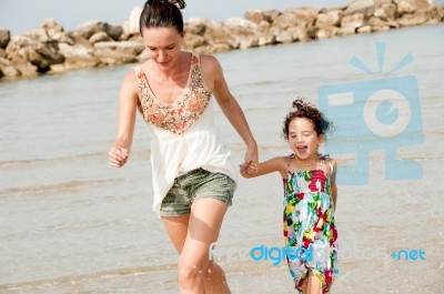 Mother Holds Daughter Stock Photo