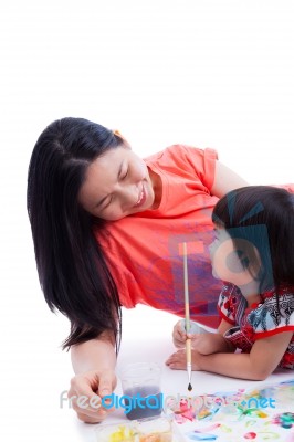 Mother With Child Girl Draw And Paint Together, On White Background Stock Photo