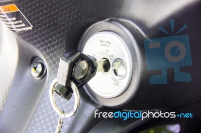 Motorbike Key In Ignition Keyhole Stock Photo