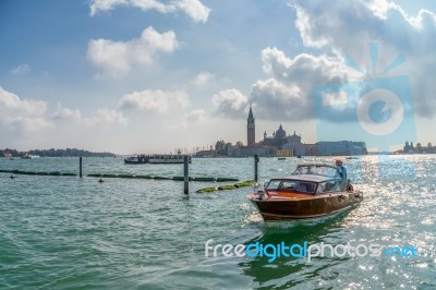 Motorboat Coming Into The Grand Canal In Venice Stock Photo