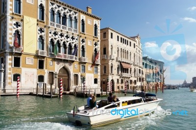 Motorboat Cruising Down The Grand Canal Stock Photo