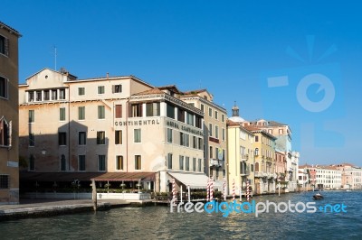 Motorboat Cruising Down The Grand Canal In Venice Stock Photo