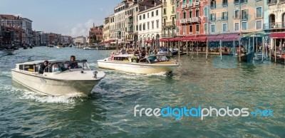 Motorboats Cruising Down The Grand Canal Stock Photo