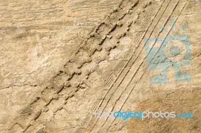 Motorcycle Tire Tracks On Soil Floor Stock Photo