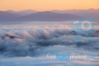 Mountain And Mist In Morning Stock Photo