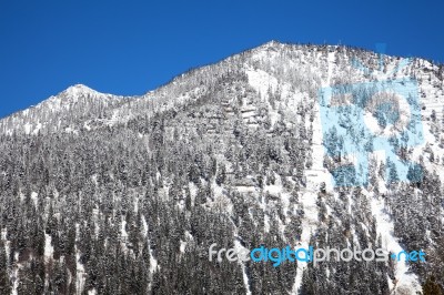 Mountain Covered In Snow In Walchensee Stock Photo