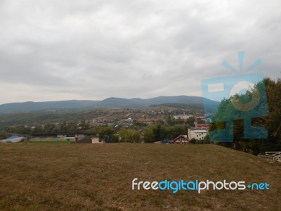 Mountain Panorama, Landscape And Buildings Stock Photo