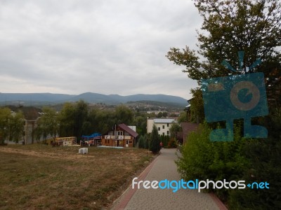 Mountain Panorama, Landscape And Buildings Stock Photo