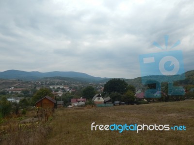 Mountain Panorama, Landscape And Buildings Stock Photo